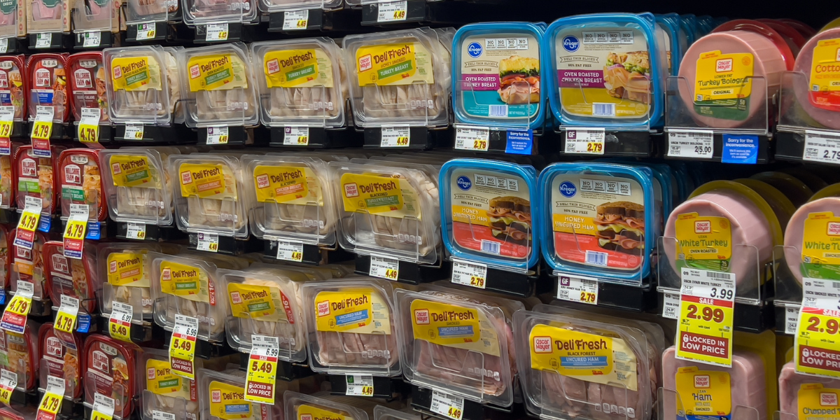 Varieties of packaged prepared deli meat on the shelves.
