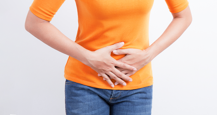 Person holding their belly