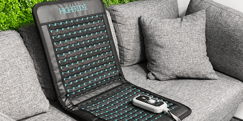 Pemf mat sitting on a gray sofa