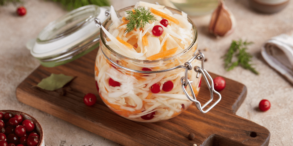 Pickled cabbage salad with carrot and cranberries
