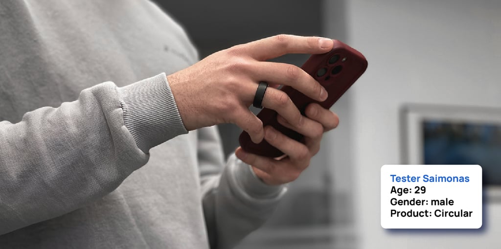 User wearing circular smart ring and using the phone
