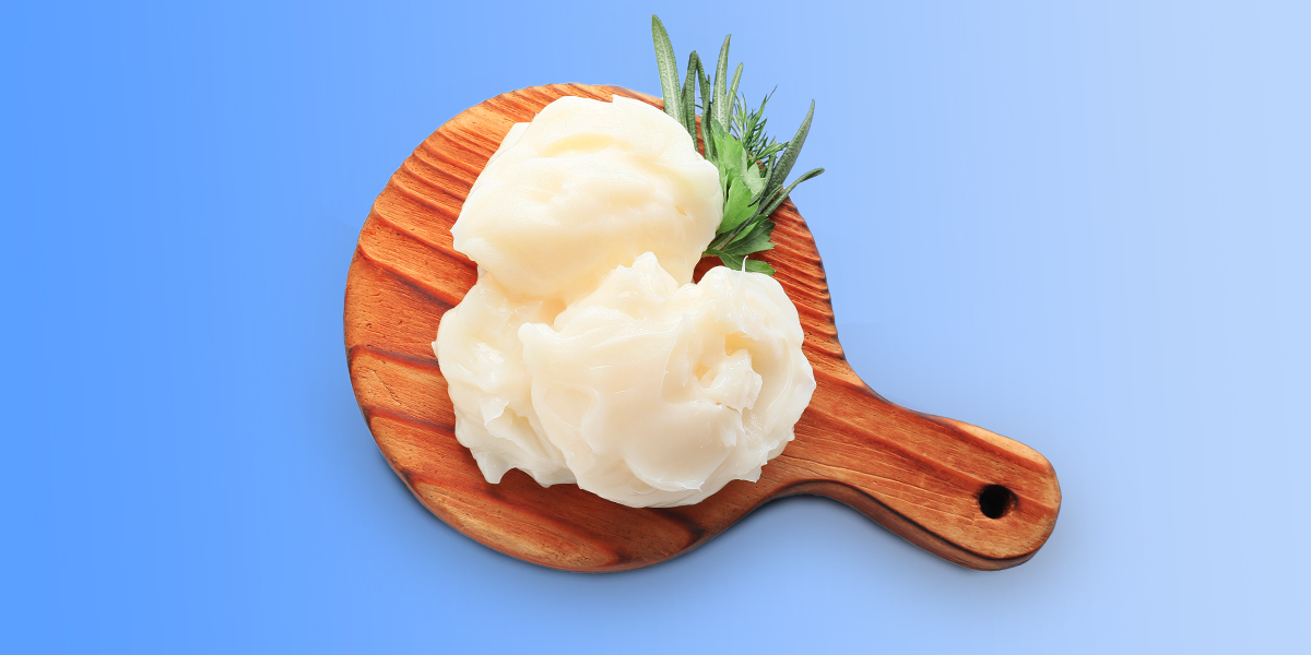 Beef tallow on a wooden cutting board
