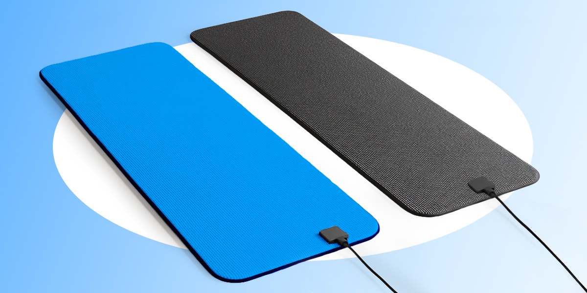 Blue grounding mat and black pemf mat next to each other in blue background