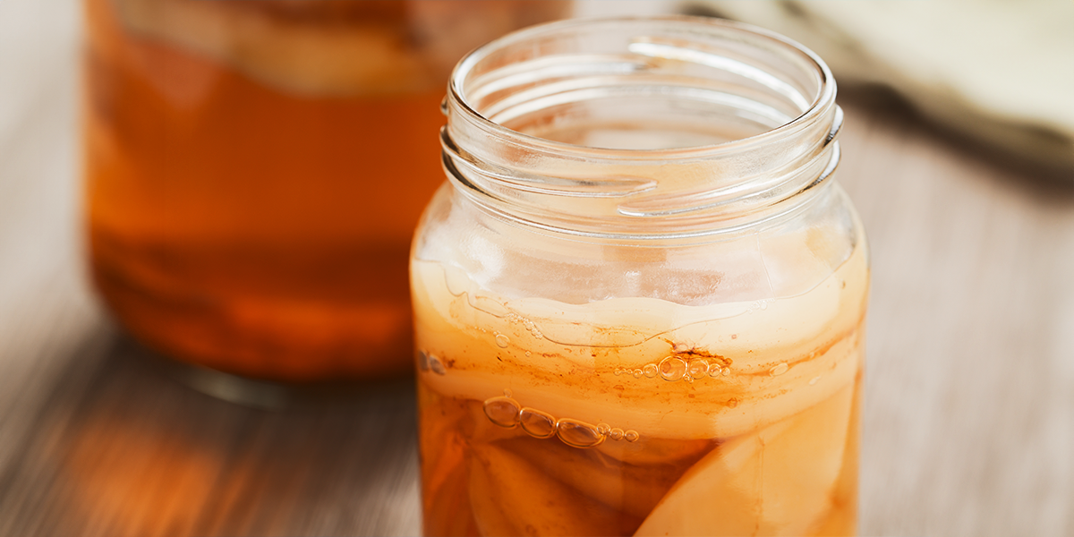 Kombucha jar on a wooden table
