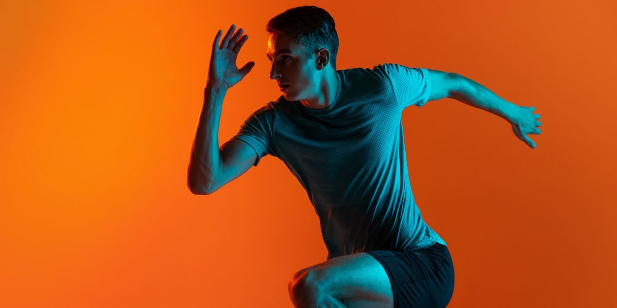 Man running wearing blue workout clothes