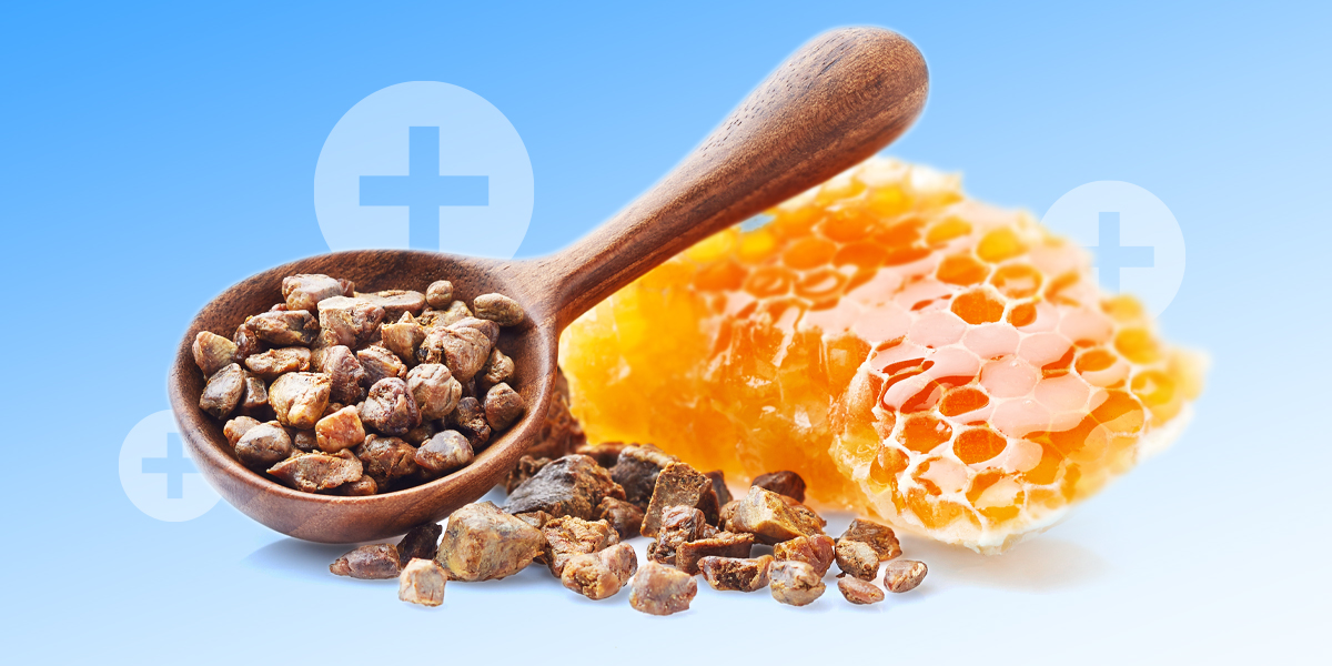 Propolis and beeswax products on the blue background