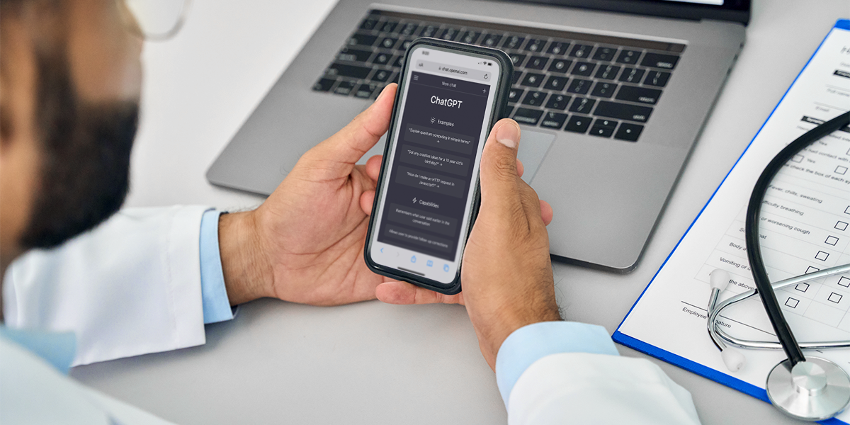 Doctor in white coat using AI on a smart phone