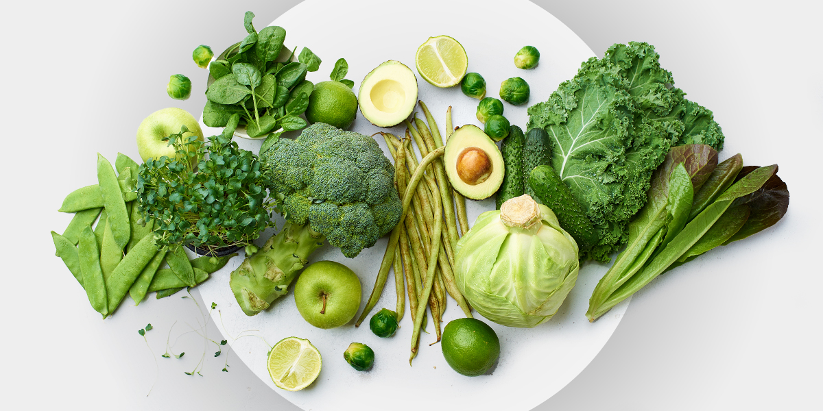 Plate full of green foods symbolizing Green Mediterranean diet