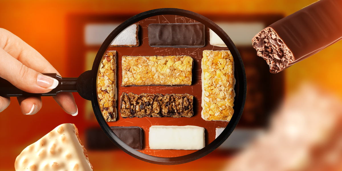 Protein bars of different kinds under a magnifying glass