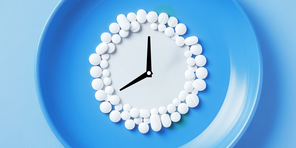 Clock made out of fasting supplements blue background