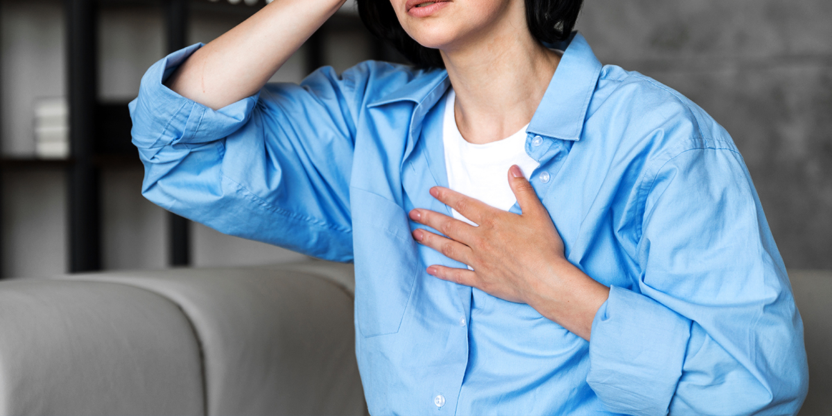 Person sitting on the couch checking homocystein levels