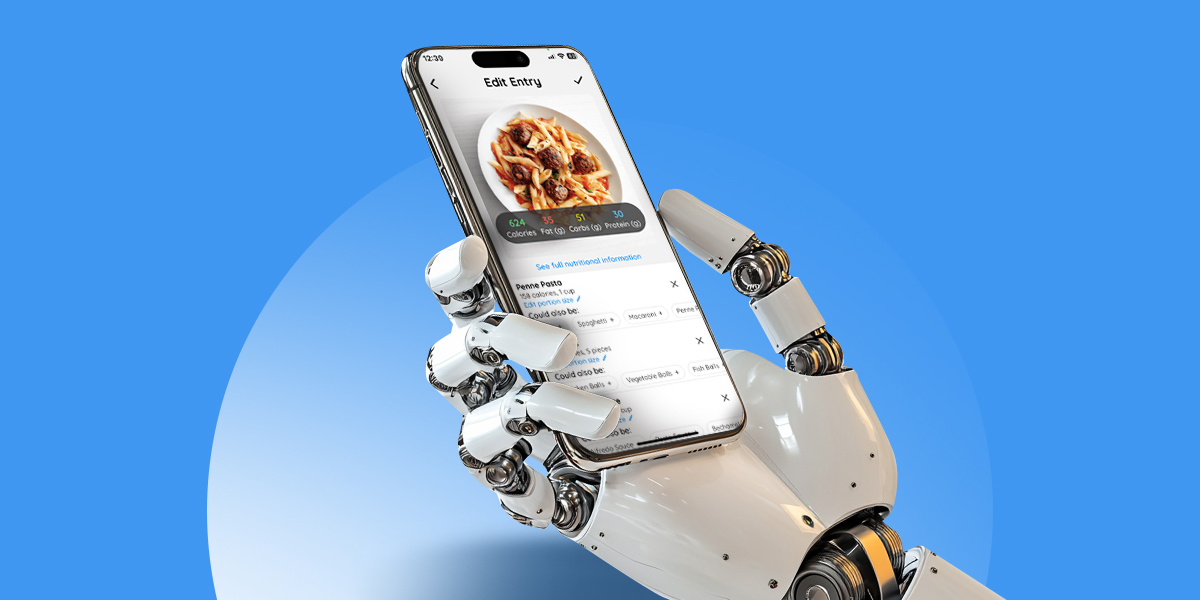 A robot's hand holding a smartphone with a SnapCalorie app open