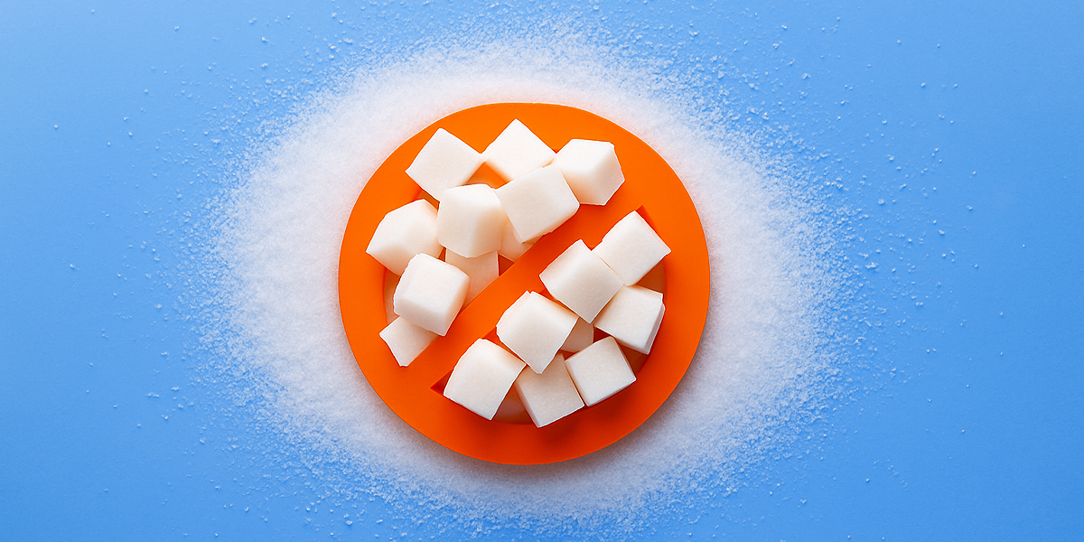 Sugar cubes on orange plate