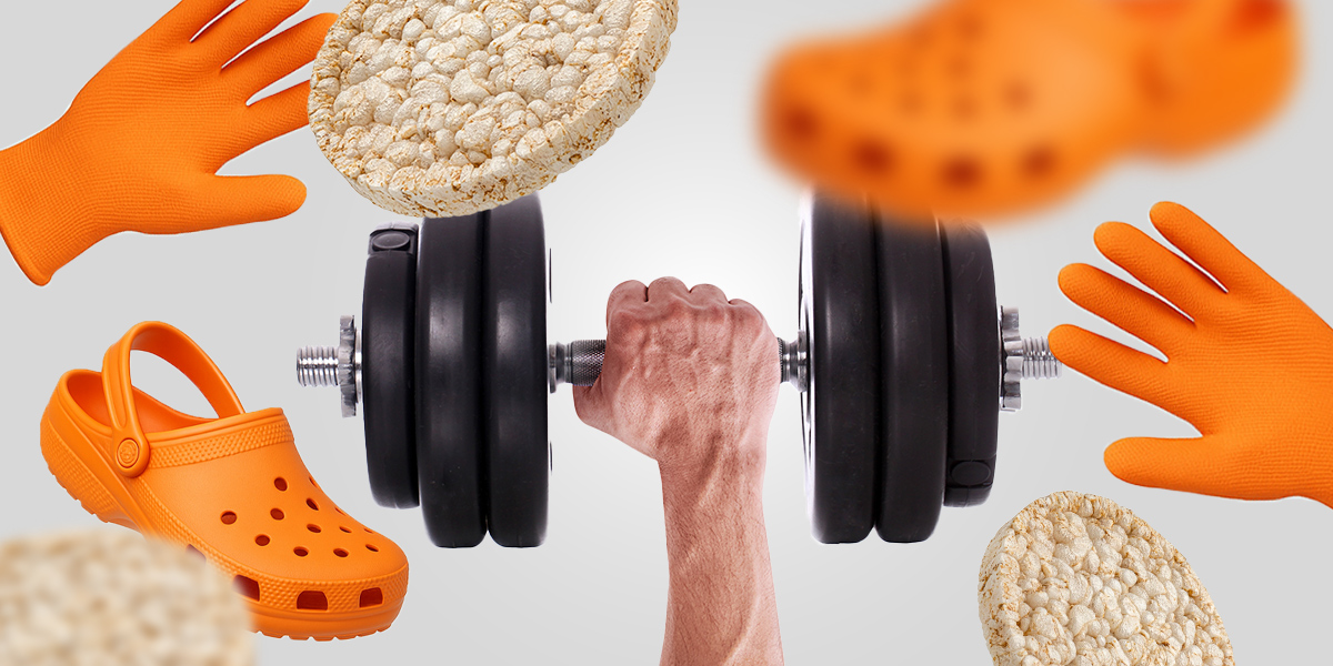Hand holding large dumbell