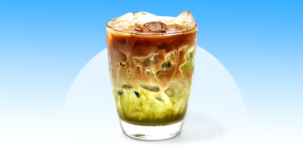 Hojicha latte in a glass cup