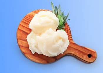 Beef tallow on a wooden cutting board