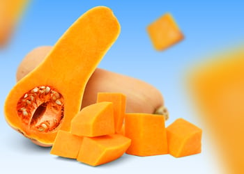 Squash sliced open in blue background