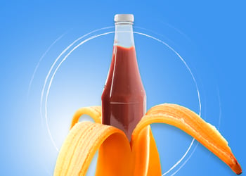 Collage of a peeled banana with a ketchup bottle inside, set against a blue background