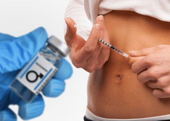 Person holding a syringe and doctor holding vial of testosterone