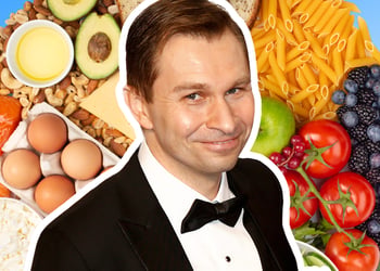 David Sinclair in a suit with background consisting of various foods
