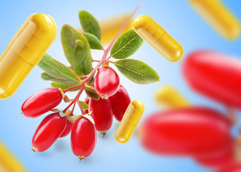 Berberines on a stick and berberine supplements flying in blue background