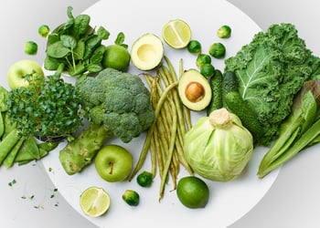 Plate full of green foods symbolizing Green Mediterranean diet