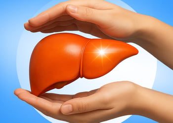 Liver in between hands with blue background