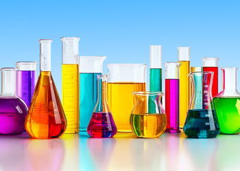 Different colored chemical glass bottles