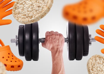 Hand holding large dumbell