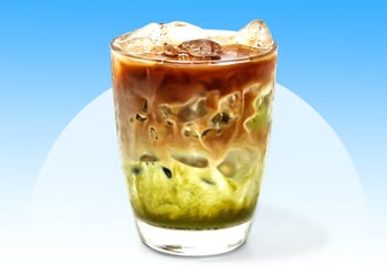 Hojicha latte in a glass cup