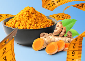Turmeric in a bowl and measuring tape