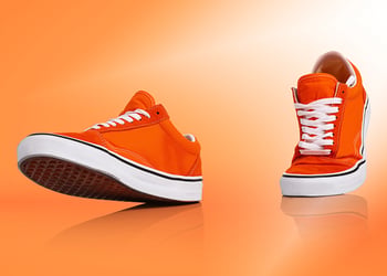 Orange shoes walking in background