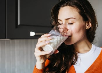 Woman drinking Oatzempic