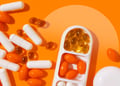 Collage of pills set on an orange background