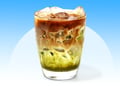 Hojicha latte in a glass cup