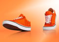 Orange shoes walking in background